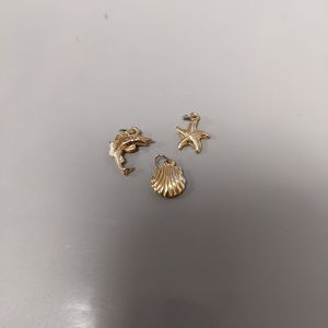 Various gold colored ocean themed pendants (set of 3)